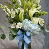 introducing Our New Design Blue Hue, beautifully arranged with lilies, hydrangea, delphinium