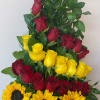 Floral design made with sunflowersand red and yellow roses, ideal for any