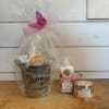 This petite gift basket includes one hand and body lotion and one