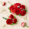 Elegant French-style corsage and boutonniere set, handcrafted with fresh roses. Perfect for