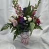 Pink snap dragon, white button mums, pink lisianthus, red tulips, hot pink