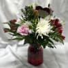 White fugi, red alstromeria, pink lisianthus, red tulis, &amp; purple monte casino