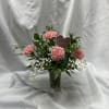 6 carnations arranged in vase with babies breath; may specify all pink