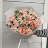 A joyful blend of soft peach and blush roses, playful pink carnations