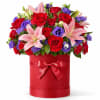 A vibrant and passionate flower box blending lush red roses, soft pink