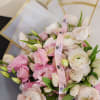 Delicate arrangement made with love, blending soft pink lisianthus, graceful white tulips