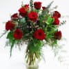1 Dozen roses arranged with accent filler - This arrangement is available