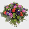 A vibrant and cheerful bouquet featuring fresh roses in bold pink and