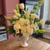Graceful Tribute is a timeless sympathy arrangement designed to honor life, express