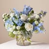 This uplifting arrangement can be a reminder of the clear skies ahead.