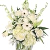 This bouquet will be in a clear vase with mixed white florals.