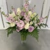 6 WHITE ROSES 10 LAVENDER ROSES 3 WHITE LILIES 6 PINK STOCK