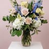 Beautiful arrangement of Hydrangeas, roses, lisianthus and delphinium to brighten your day!