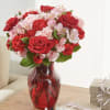 As sweet as candy, this pink and red arrangement is sure to