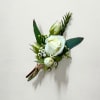 A pin-on boutonniere is a classic and traditional floral accessory, It is