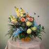 A beautiful mix of pastel garden flowers

Please Note: Each design is custom