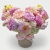 Beautiful pastel blossoms of the day like roses hydrangeas daisies stock and