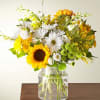 Give a dose of sunshine in bloom. This stunning bouquet is teeming