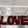 Floral white box love design decorated with red roses 