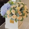 This Luxury flower box with ivory 50 roses and hydrangea is a