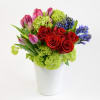 Inspired by the beauty of Amsterdam, this elegant arrangement expresses deep love