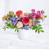 Bloom Flux is a high-energy floral arrangement full of vivid color transitions