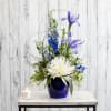 Soothing blue and white blooms are given a contemporary twist in a
