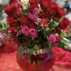 1 DOZEN RED ROSES COUPLED WITH SPRAY ROSES, DIANTHUS, AND WAXFLOWER IN