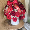 Red roses and carnation  with babybreath in a box with birthday