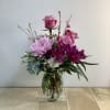 A very pretty bouquet of fresh lavender roses, cremone flower, alstroemeria and