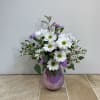 A delightful bouquet of fresh white daisies, limon and lavender mini carnations