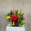 Bold, exotic, and irresistibly romantic, this tropical-inspired Valentine&rsquo;s arrangement brings a lush