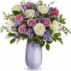 Ecuadorian White and Lavender roses bring the splendor to this beautiful design