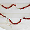 Rosary of petite red sweetheart roses with a silver-toned metal chain accented