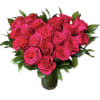 19 hot pink roses designed in a heart shape with greens in
