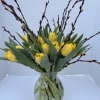 Bright lemon yellow tulips bring the sunshine on the dreariest day. 