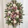 The Multicolor Pastel Sympathy Standing Spray by DGM Flowers | Fort Lauderdale
