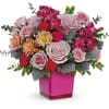 Teleflora's Growing Love Bouquet is X's and O's bundled up into a