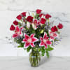 Fragrant Stargazer lilies and beautiful red roses are a match made in