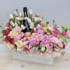 A beautiful bed of pink flowers to showcase your favorite bottle of