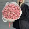 A breathtaking bouquet of delicate pink spray roses, gathered into a soft