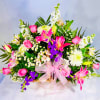 This beautiful basket has an abundant supply of gorgeous pink lilies, pink