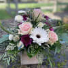 Roses, Gerber daisies and mums in a rustic wood box . Colors