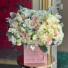 Brighten any space with our Elegant Flower Box Arrangement! Bursting with vibrant