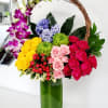 Bring that smile out with this expertly curated fusion of colorful blooms