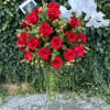 elegant and sophisticated arrangement where the intensity of red roses blends harmoniously