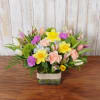 Charming spring flowers that will sweeten any room.  Tulips, daffodils and