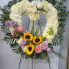 Honor a loved one with this standing heart-shaped arrangement that celebrates someone