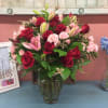 Show her your romantic side with a A Dozen Red Roses added