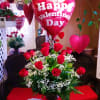 Includes 1 Dozen Roses, balloon, Chocolate, small Teddy Bear